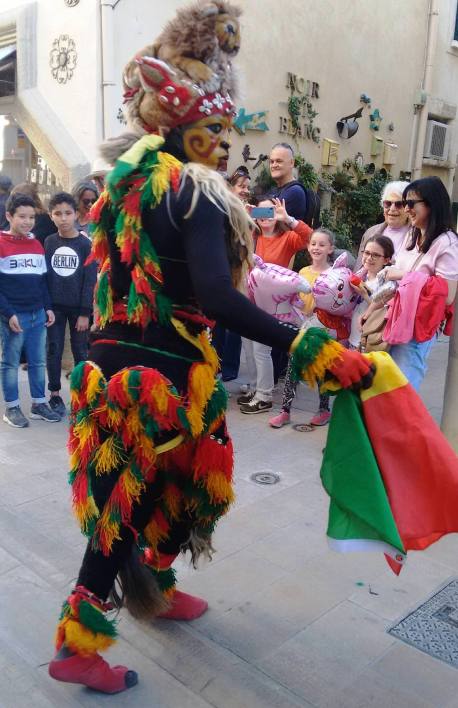 This sinister figure gives winter the heave-ho, out the door.